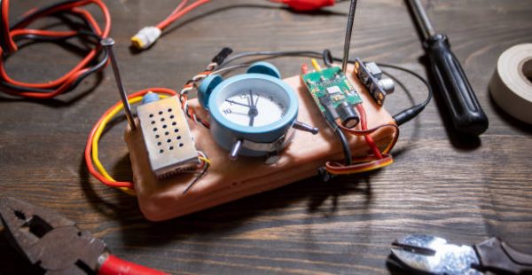 time bomb constructed on wooden table